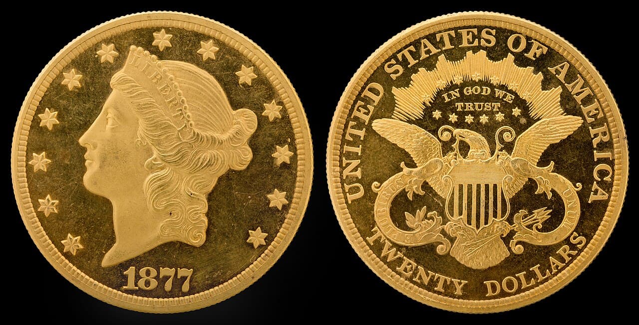 Obverse and reverse of an 1877 Liberty Head $20 gold double eagle
